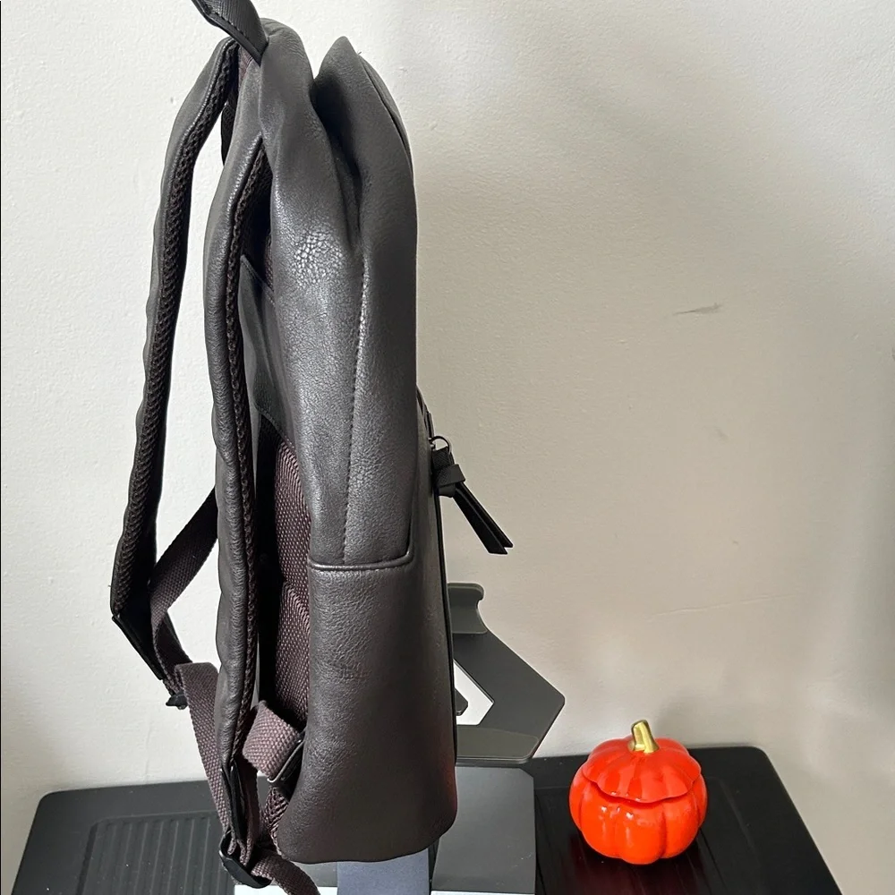 Ted Baker faux leather backpack in dark brown with bold stripe detail!